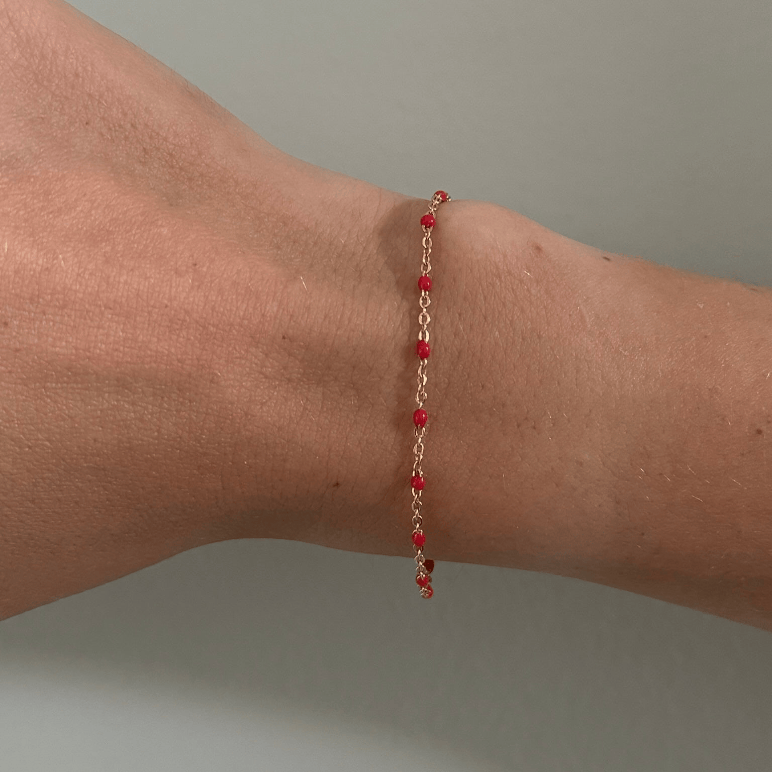 Cuffed by Nano LLC red daisy bracelet