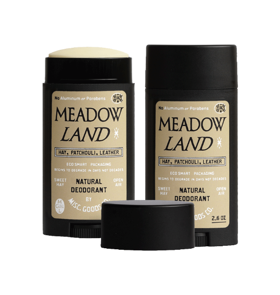 Two bottles of Meadow Land natural deodorant on a white background
