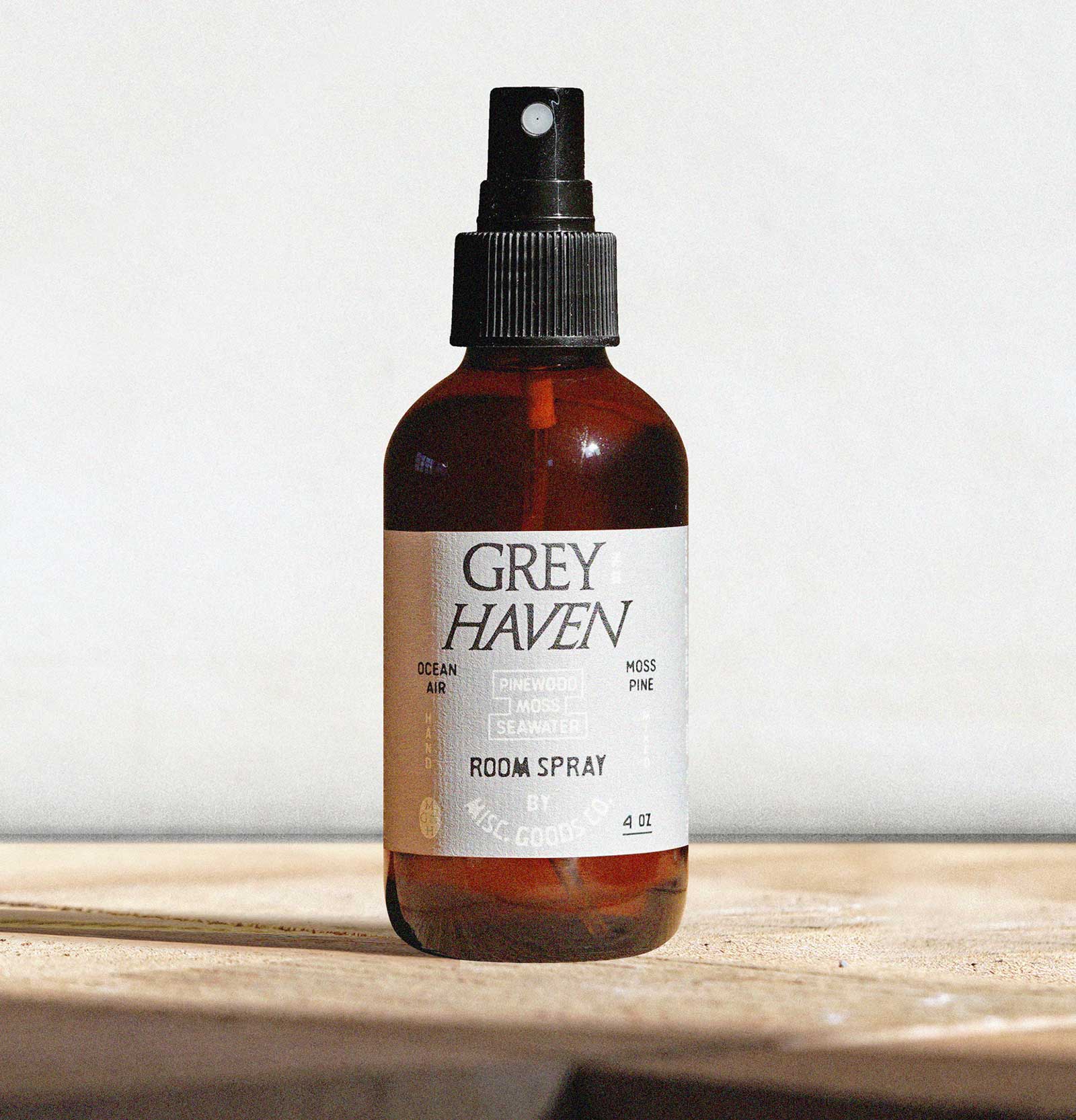 Brown spray bottle labeled &