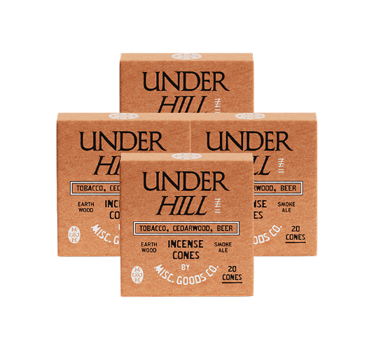 Four boxes of Under Hill Incense Cones on a white background