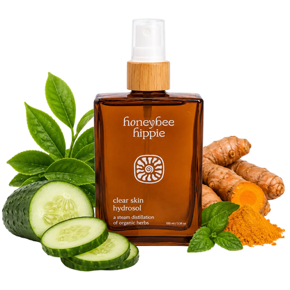 Honeybee Hippie clear skin hydrosol bottle with natural ingredients on a white background
