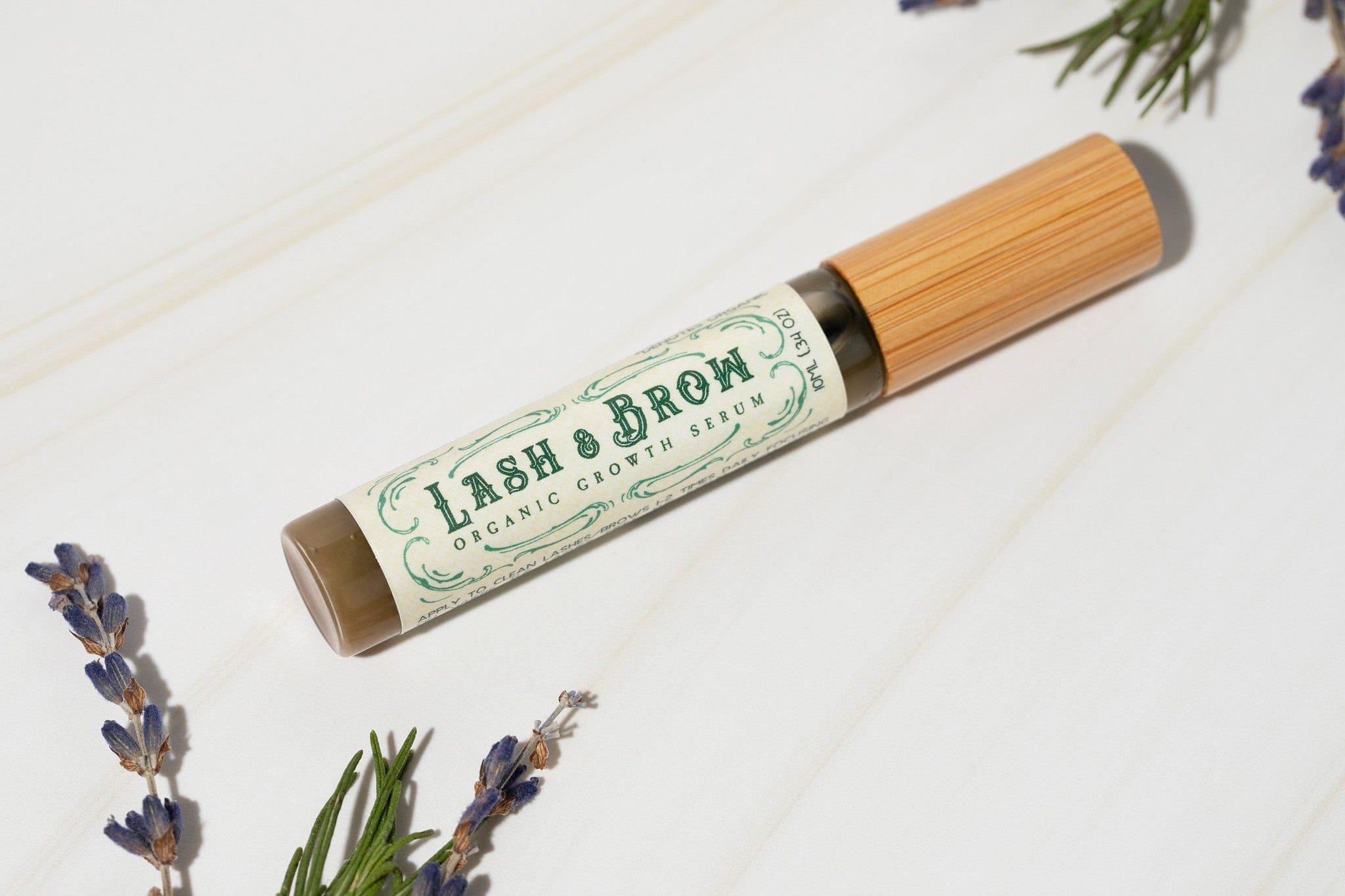 Roots and Leaves, LLC Organic Lash &amp; Brow Serum with cold pressed castor oil and pearl powder