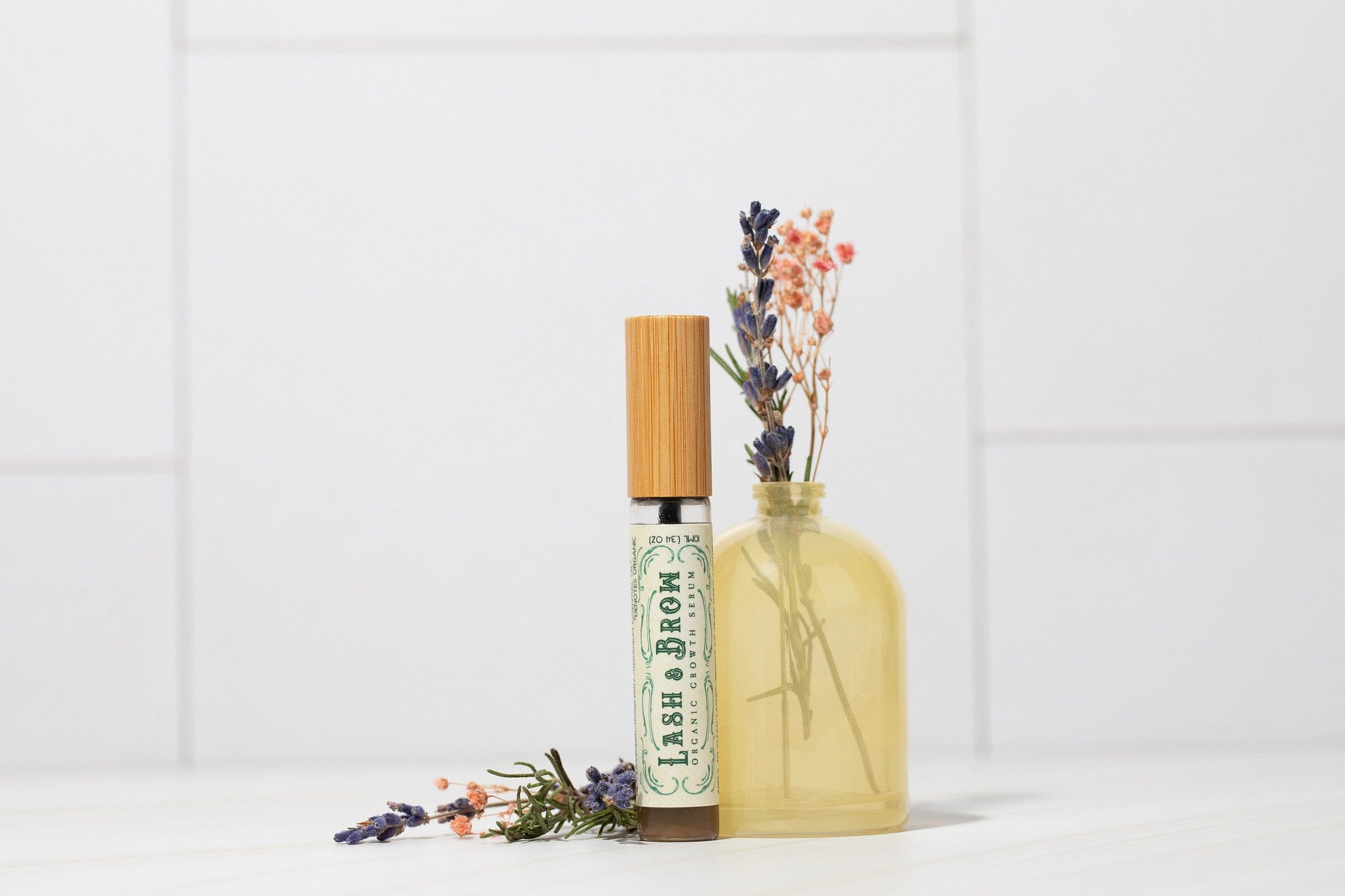 Roots and Leaves, LLC Organic Lash &amp; Brow Serum with cold pressed castor oil and pearl powder