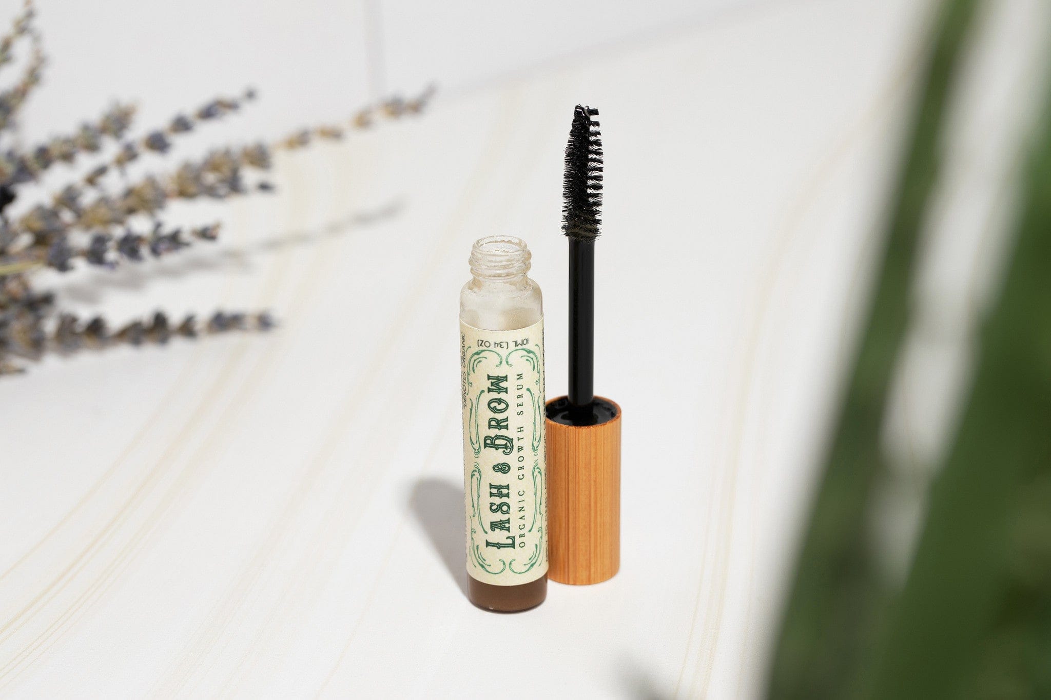 Roots and Leaves, LLC Organic Lash &amp; Brow Serum with cold pressed castor oil and pearl powder
