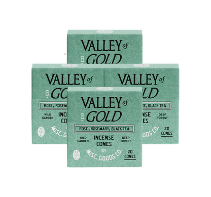 Multiple boxes of Valley of Gold incense cones on a white background