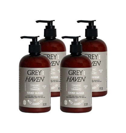 Four bottles of Grey Haven hand wash on a white background