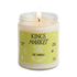 Soy candle in a glass jar with a label on a white background